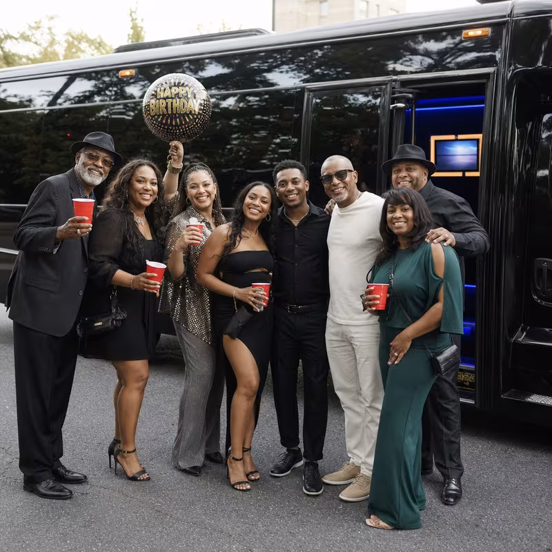 Party bus interior with wraparound leather seating and LED lighting in Lancaster