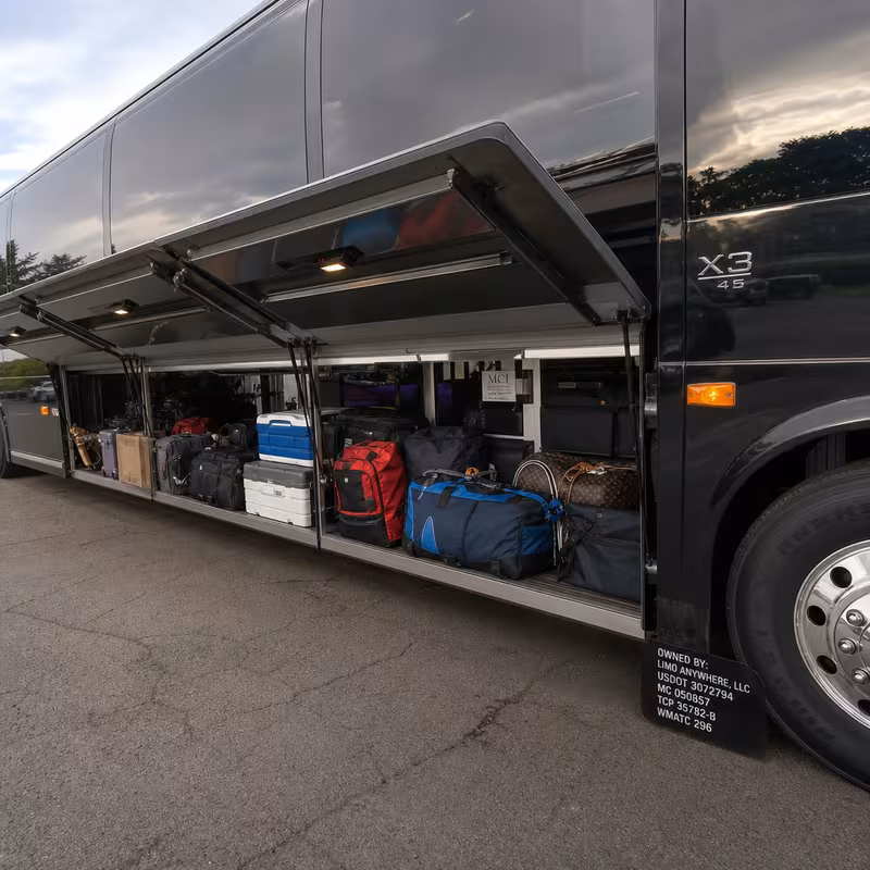Party bus interior with wraparound leather seating and LED lighting in Lancaster