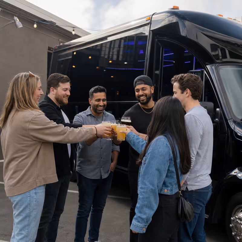 Passengers loading luggage while boarding an Lancaster group shuttle